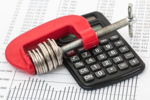 Berkley Debt Refinancing Canva Coins and Calculator on a Invoice 2 300x200