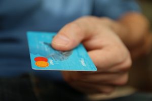 Michigan Credit Card Debt Settlement shopping business money pay 50987 300x200 1